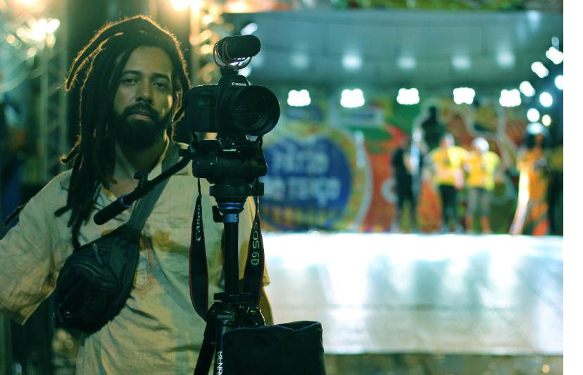 renan peixe e câmera fotográfica